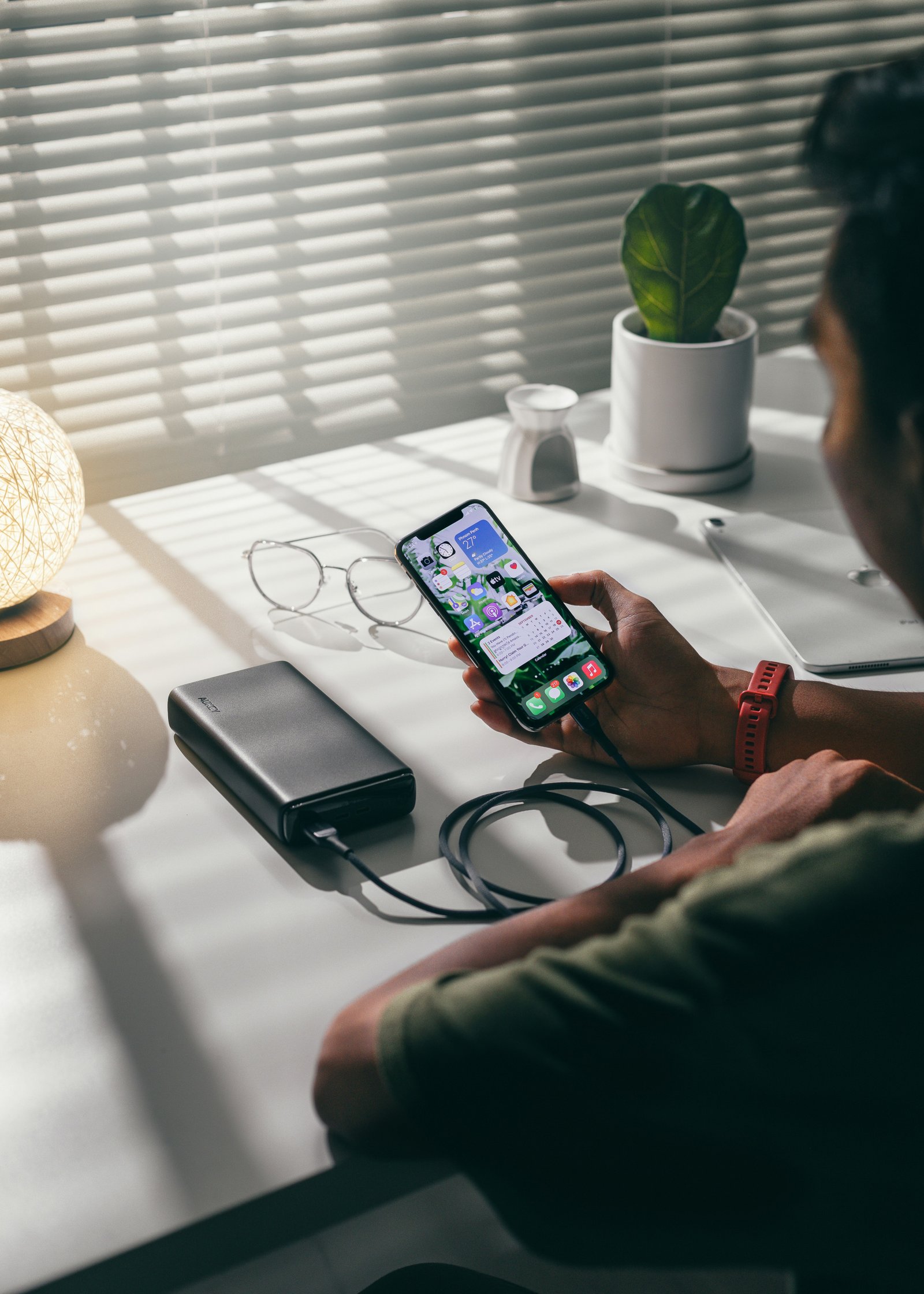 Man charging phone with power bank